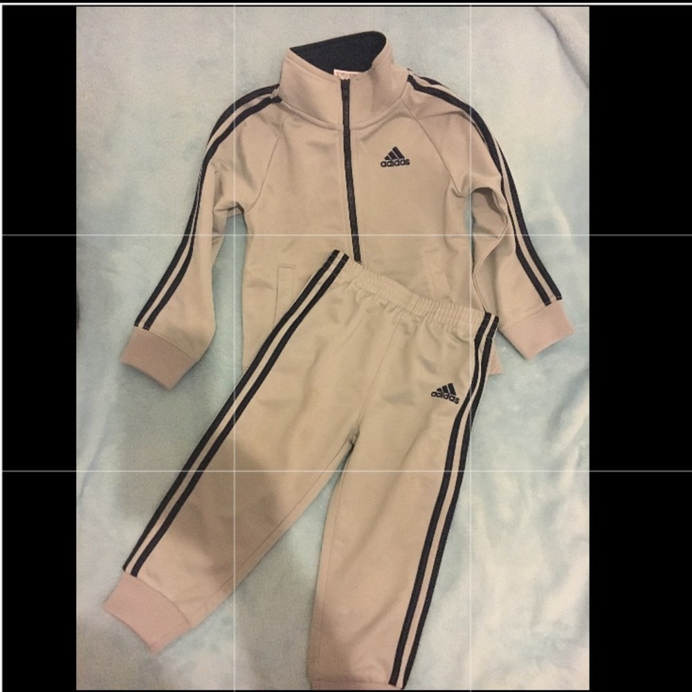 Adidas Track suit and 1 item for FREE